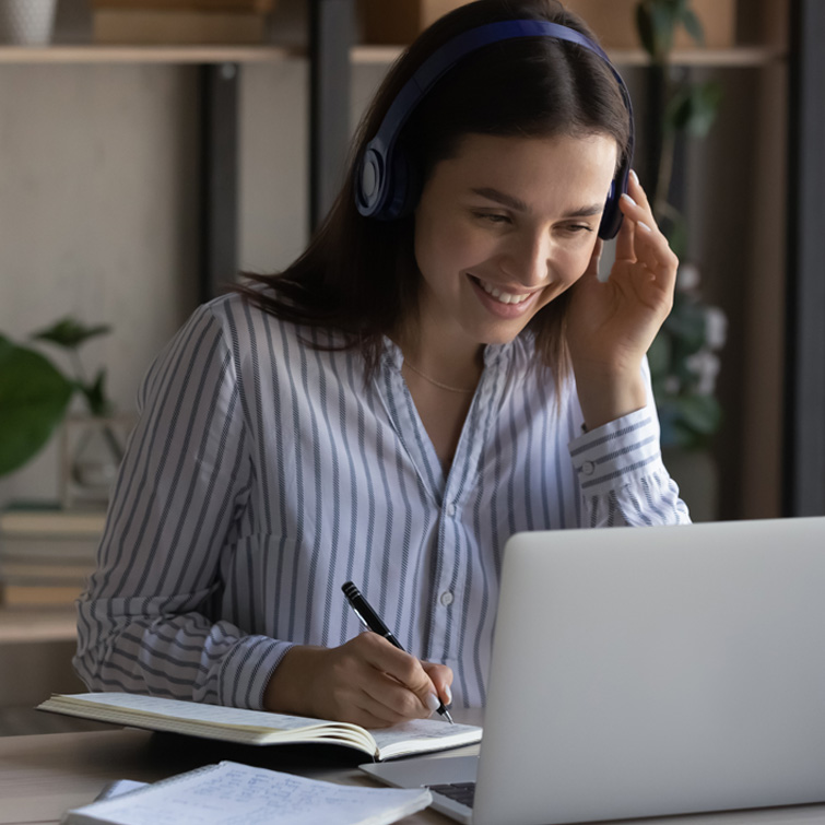 Lady on Video Conference Writing